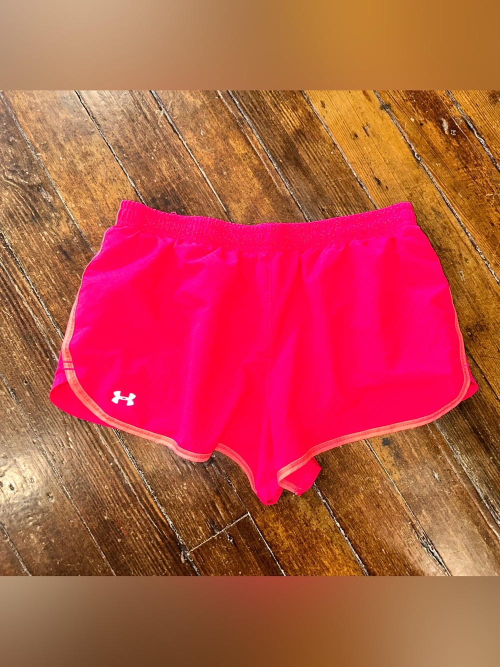 Under Armour Women's Bright Pink Athletic Shorts with Contrast Trim